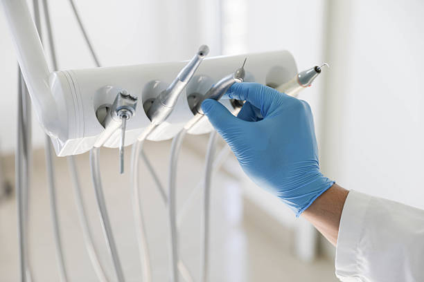 Professional Tooth Extraction technician working in Nash, TX